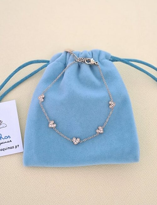 Pulseira dourada corações